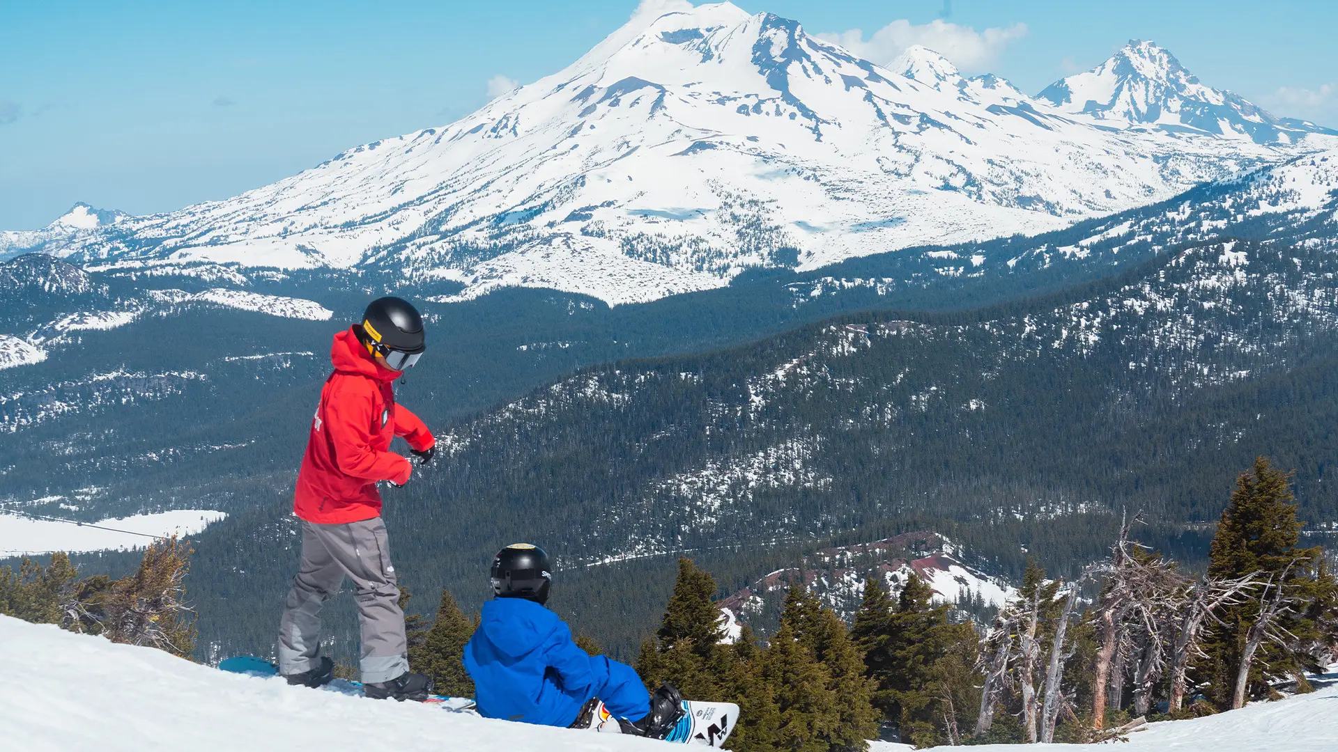 Instructor Teaching a Snowboarding Lesson