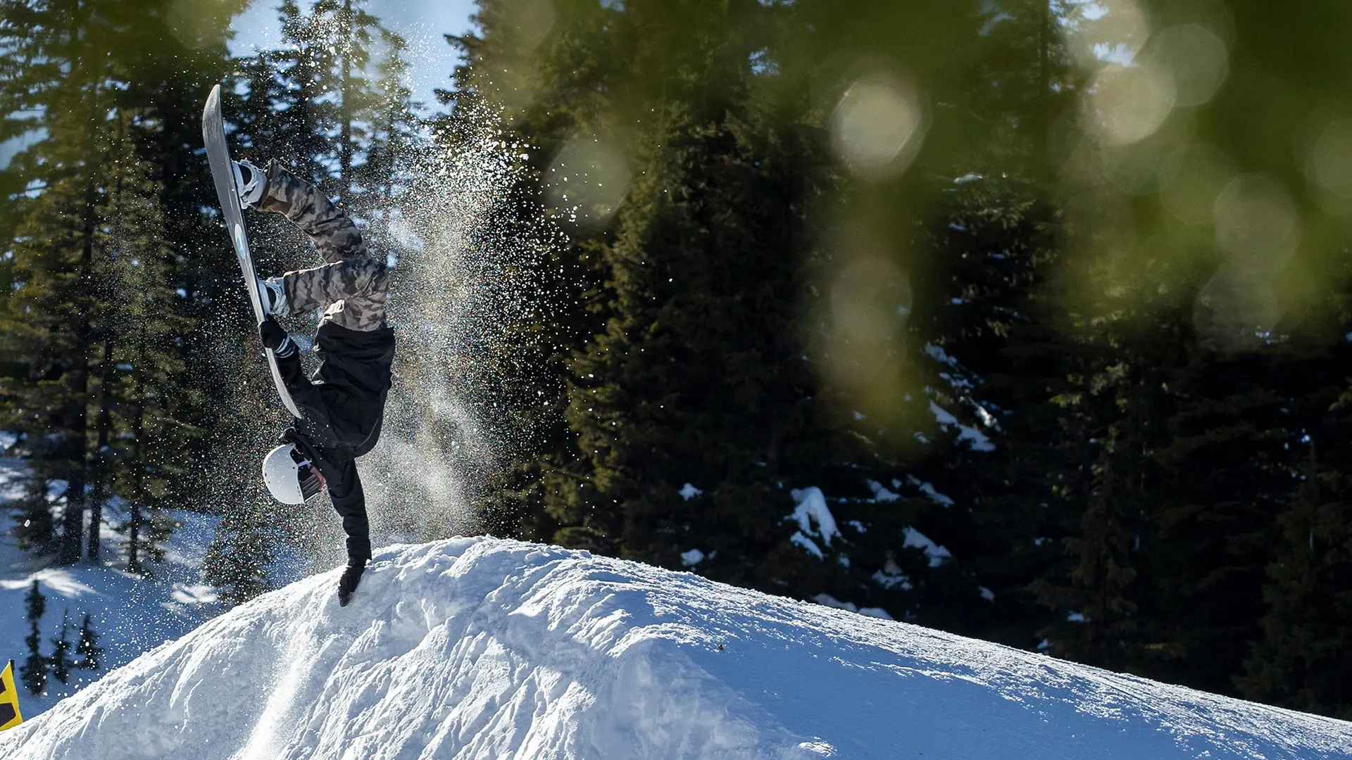 Snowboarder Does a Hand-Plant in Mt. Bachelor Woodward Mountain Park