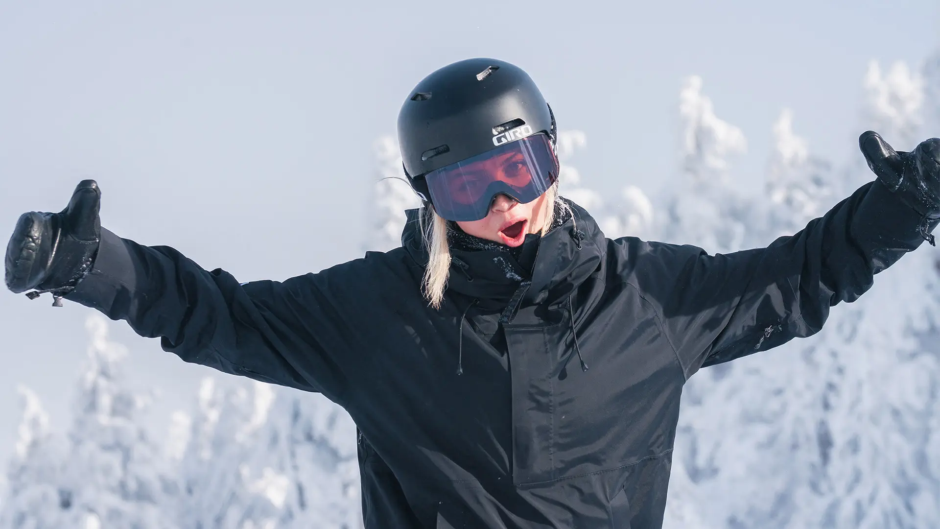 Stoked Snowboarder Using Fast Tracks at Mt. Bachelor