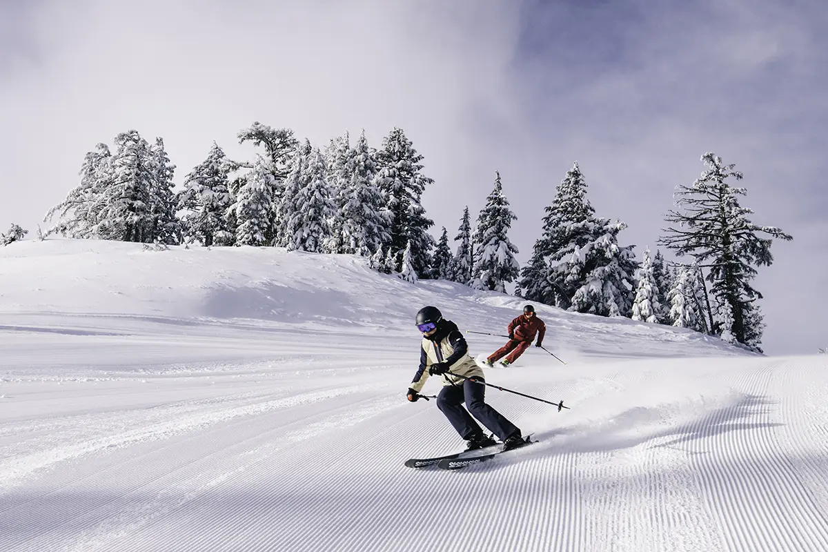 2 Skiers on a groomed trail at Mt. Bachelor