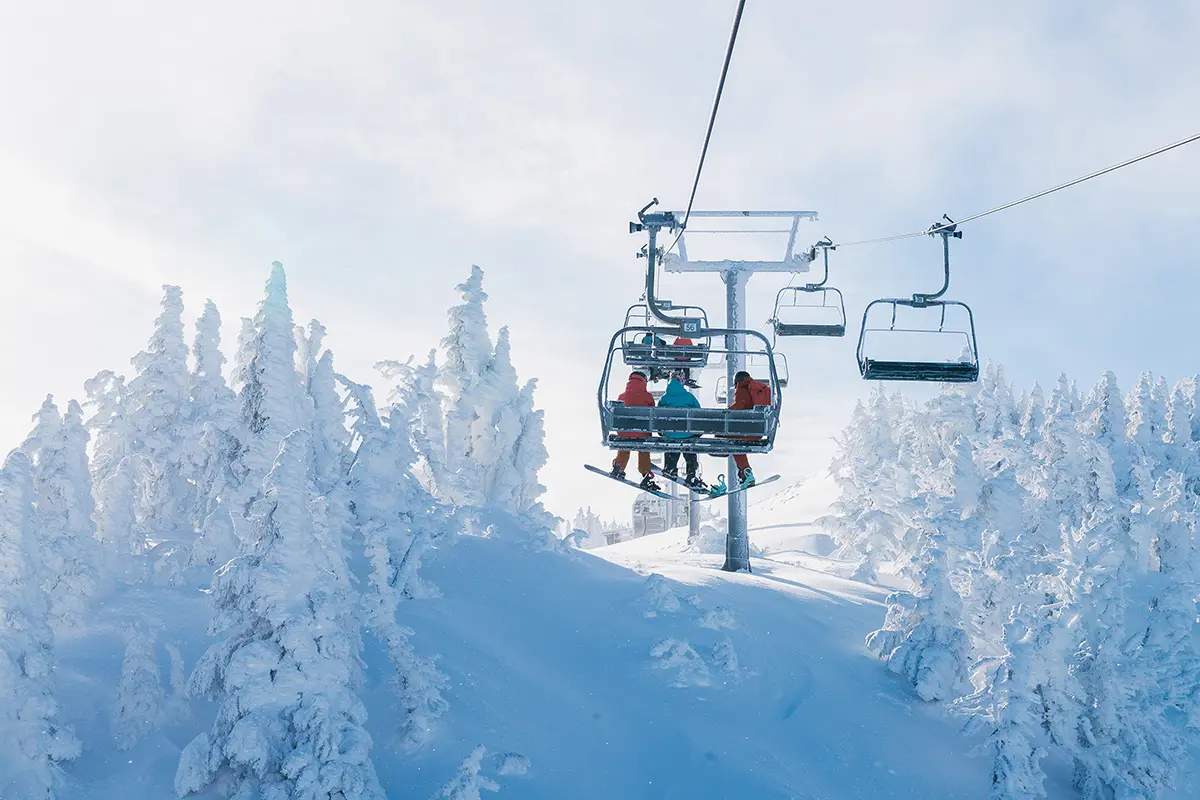 Riders on a chairlift at Mt. Bachelor