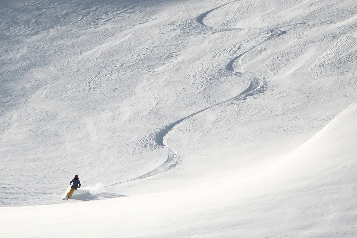 Skier making a line in the back bowls at Mt. Bachelor