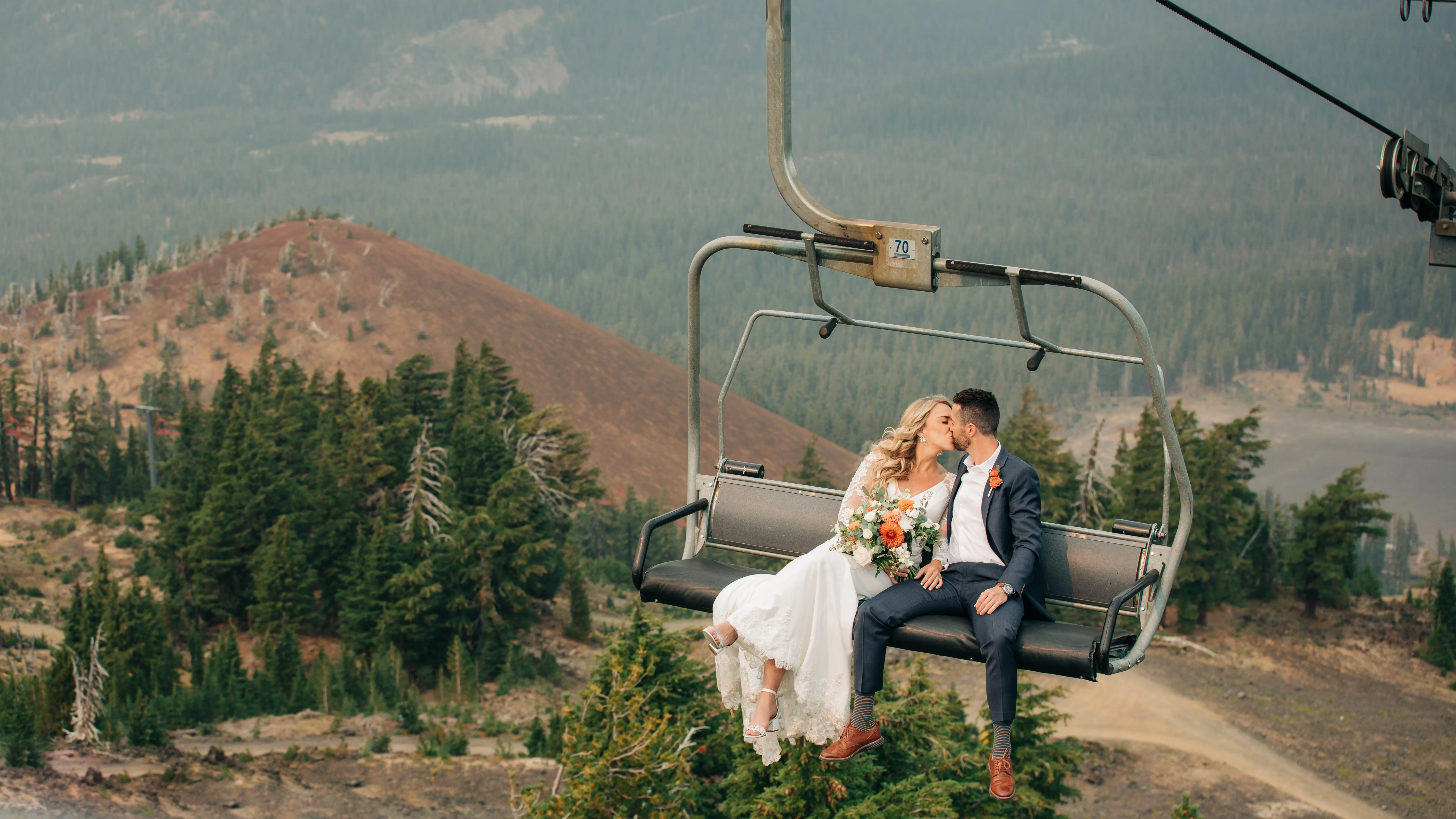 married on the chair lift in the mountains