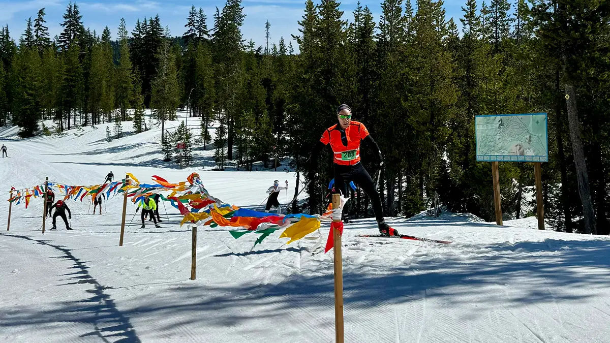 Skiers previewing the Pole Pedal Paddle course.