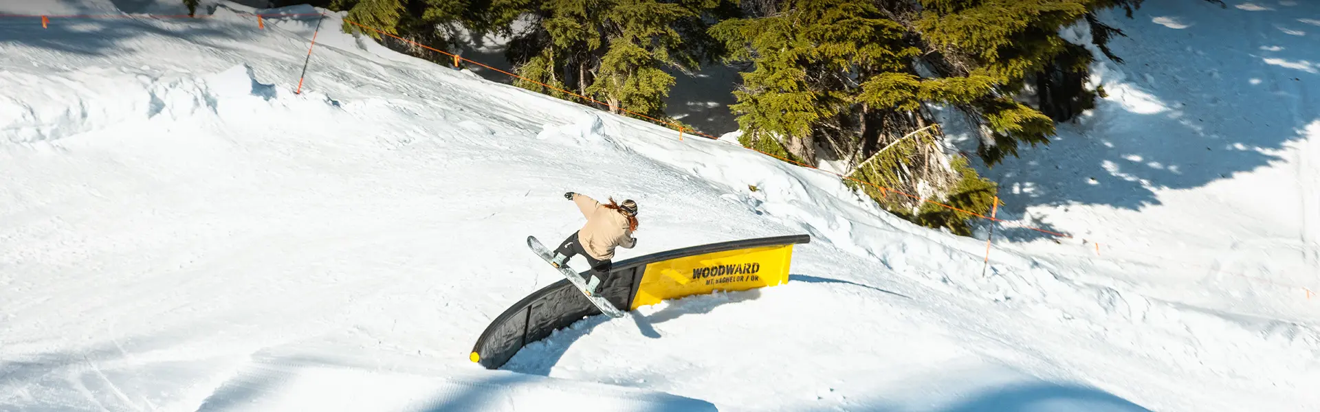 Boardslide on Woodward rail